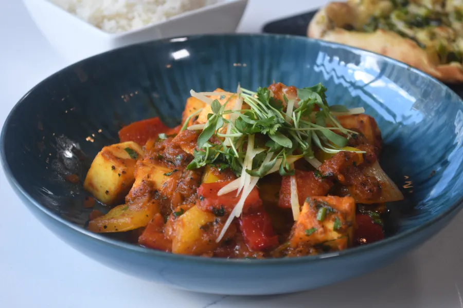 Kismet Modern Indian signature dishes Black Pepper PaneerHyderabadi Dum BiryaniPalak Paneer